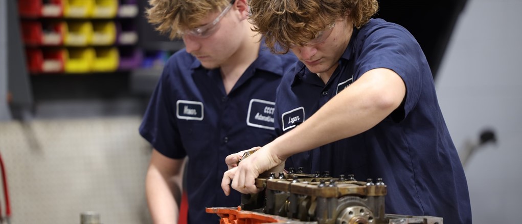 AT student working on engine 